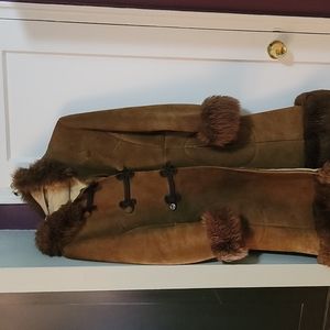Irving Posluns size 16 (runs small) camel color suede and sheepskin coat.